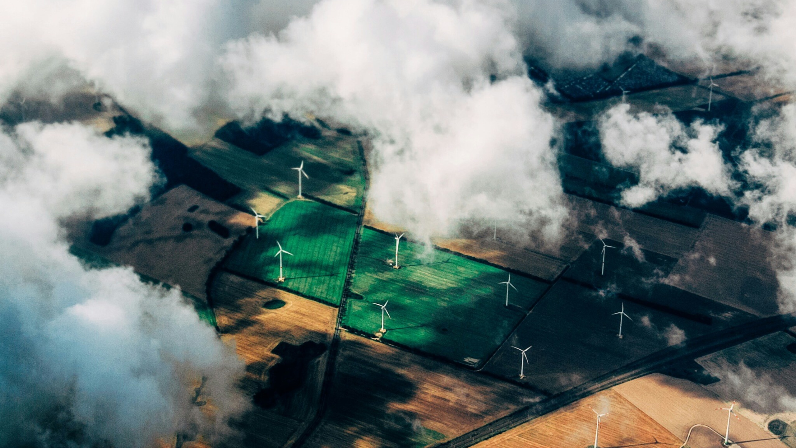 Aerial photo of wind turbines in farms.