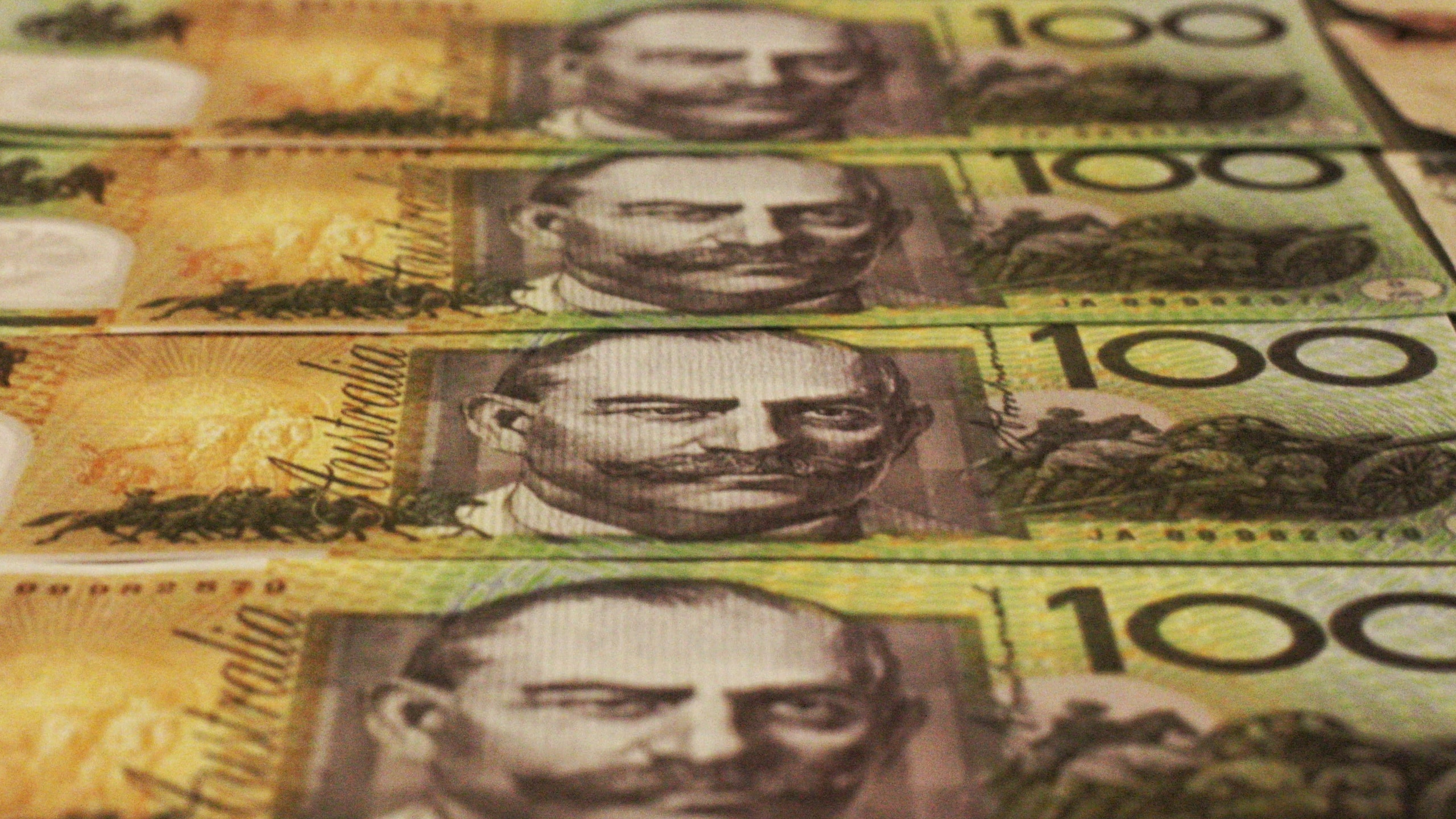 Four $100 Australian notes