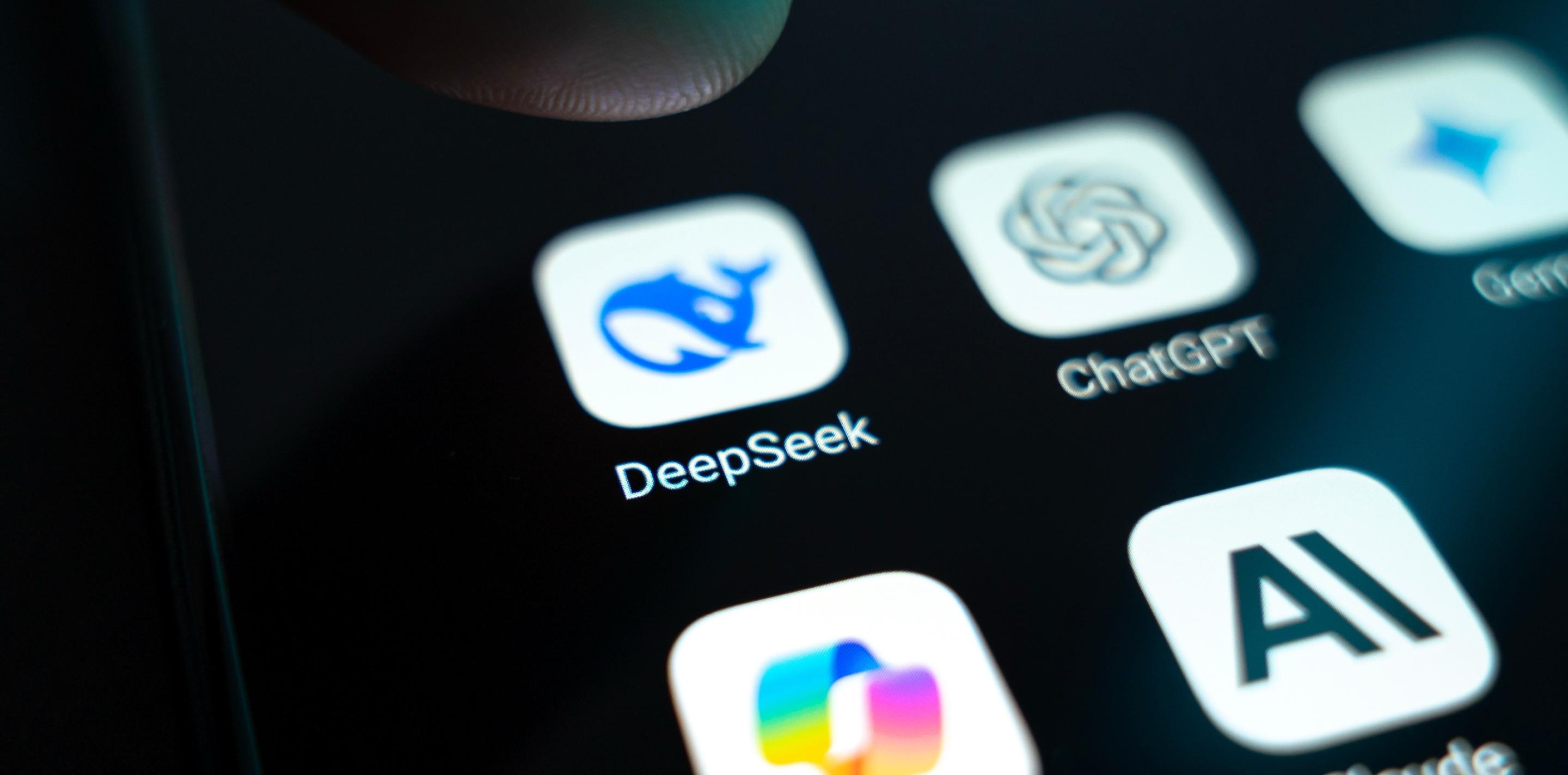 Close-up of a smartphone screen showing AI app icons, including DeepSeek, ChatGPT, and Claude.