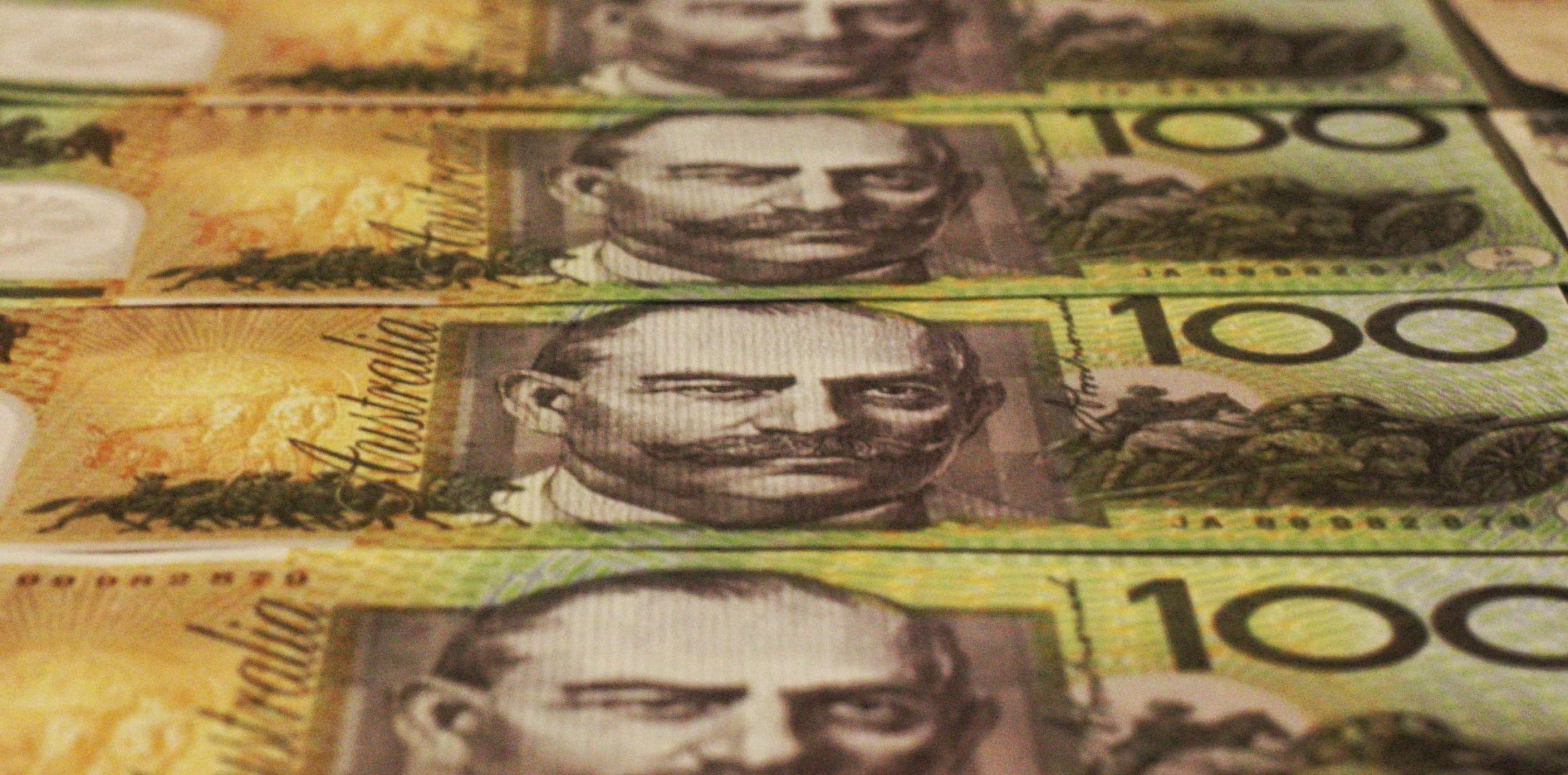 Four $100 Australian notes