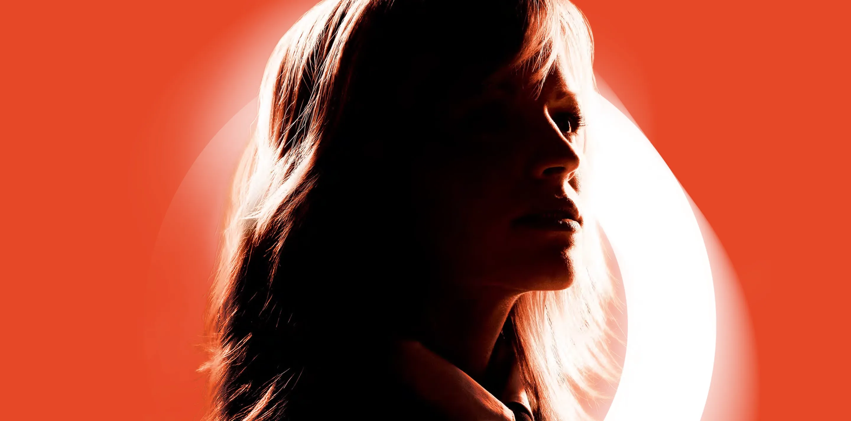 Silhouetted profile of a person facing right, backlit by warm orange and white lighting against an ochre background.